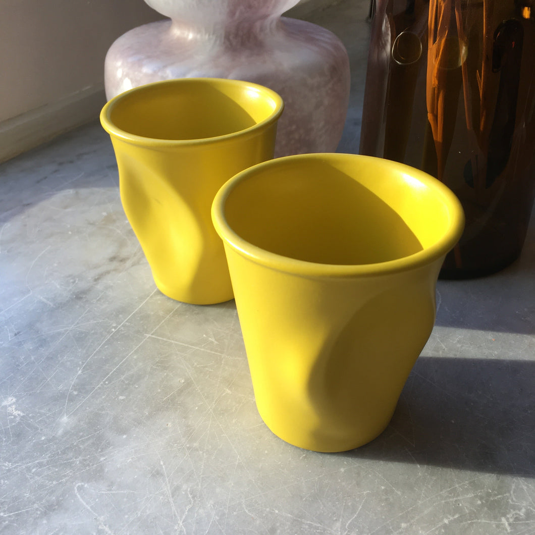 Scrunched yellow cups